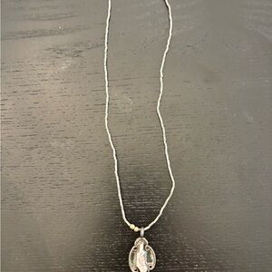 Vintage sterling silver mother of pearl dove pendant necklace.